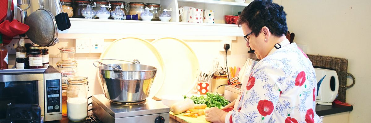 preparing ingredients in artisan preserving kitchen